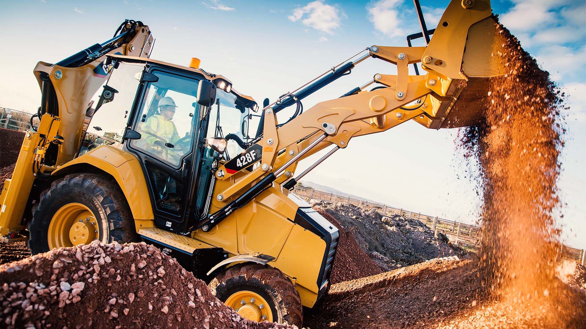 Экскаватор-погрузчик CAT 428